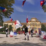 Festa della vendemmia in Umbria, persone che celebrano tra vigneti e grappoli d'uva.