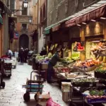 Bologna e il Quadrilatero: il piccolo itinerario dove botteghe e mercato raccontano ancora il centro